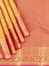 Gracecharm Pure Silk Traditional Geometric jacquard boxes with Intricate gold woven floral brocade on the border
Saree
