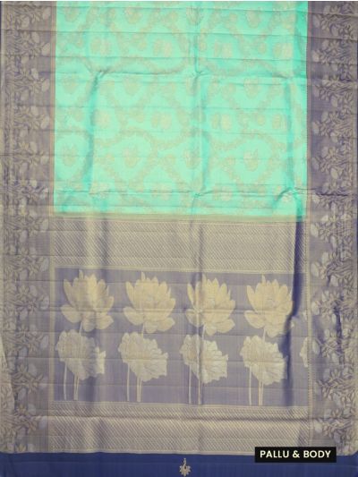 Kanmanie Tissue Silk Floral Motif with 6 Inch Jacquard Contrast Floral Border Saree